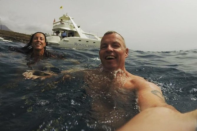 Whale Watching Catamaran Cruise with Transfer, Buffet by MC - Onboard Comfort: Sundecks, Fly-Bridge, and Space to Breathe